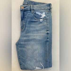 American Eagle Blue Jeggings with Vintage Fading and Distressed Details